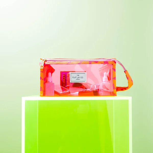 The Flat Lay Co. Open Flat Makeup Jelly Box Bag - Pink Dribbles On Orange 6 The Flat Lay Co. Open Flat Makeup Jelly Box Bag - Pink Dribbles On Orange - Image 4